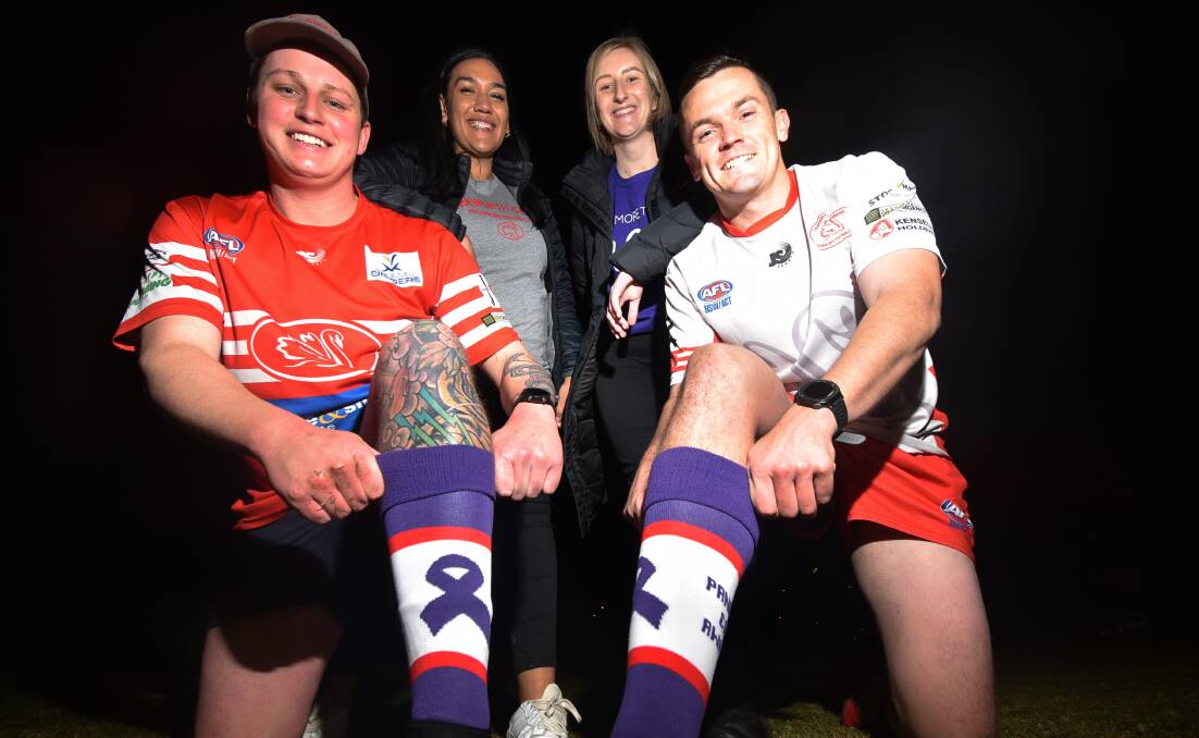 A GOOD CAUSE: Ben Simmons, Naomi Burke, Bianca Hughes and Todd Jones will be raising awareness for Pancare this weekend with the Swans. Photo: Ben Jaffrey