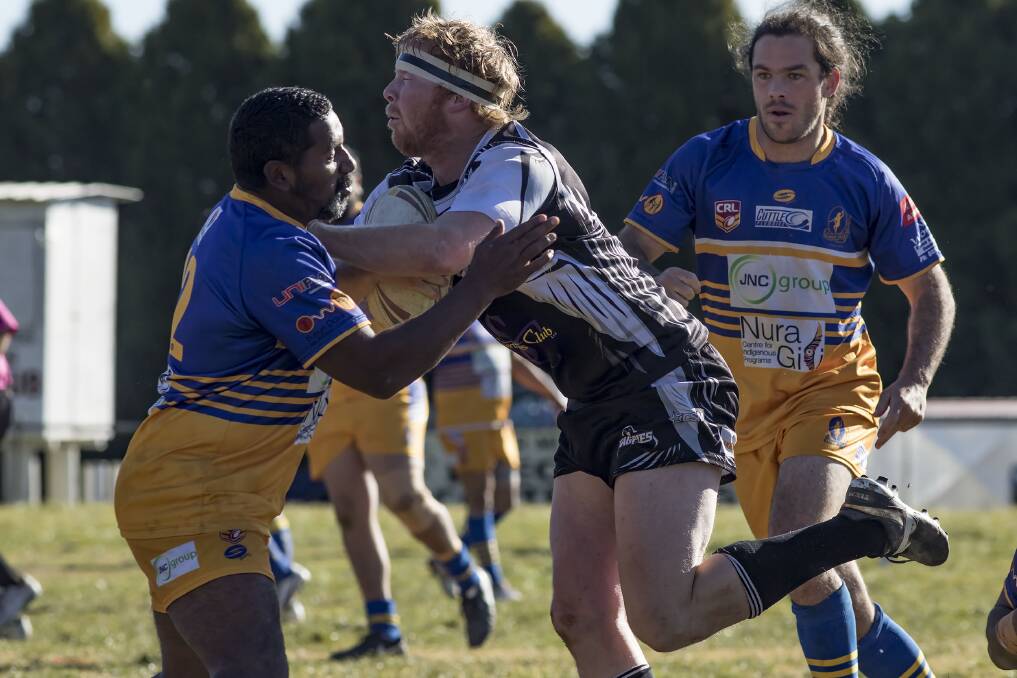 COLLISION: Glen Innes Magpies lock Daniel Cheers is met by Narwan backrower Gary Quinlan in the A grade match. Photo: Tony Grant. 
