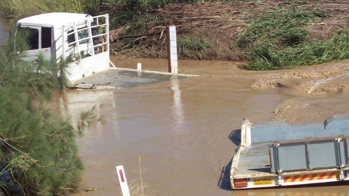 DEEP: This truck got caught in floodwaters at Burgmanns Lane. Photo: Steve Grierson