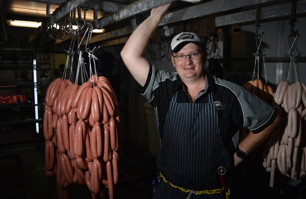 NEARLY BARE: Owner Jamie Firth in the Northgate Butchery cool room. Photo: Ben Jaffrey