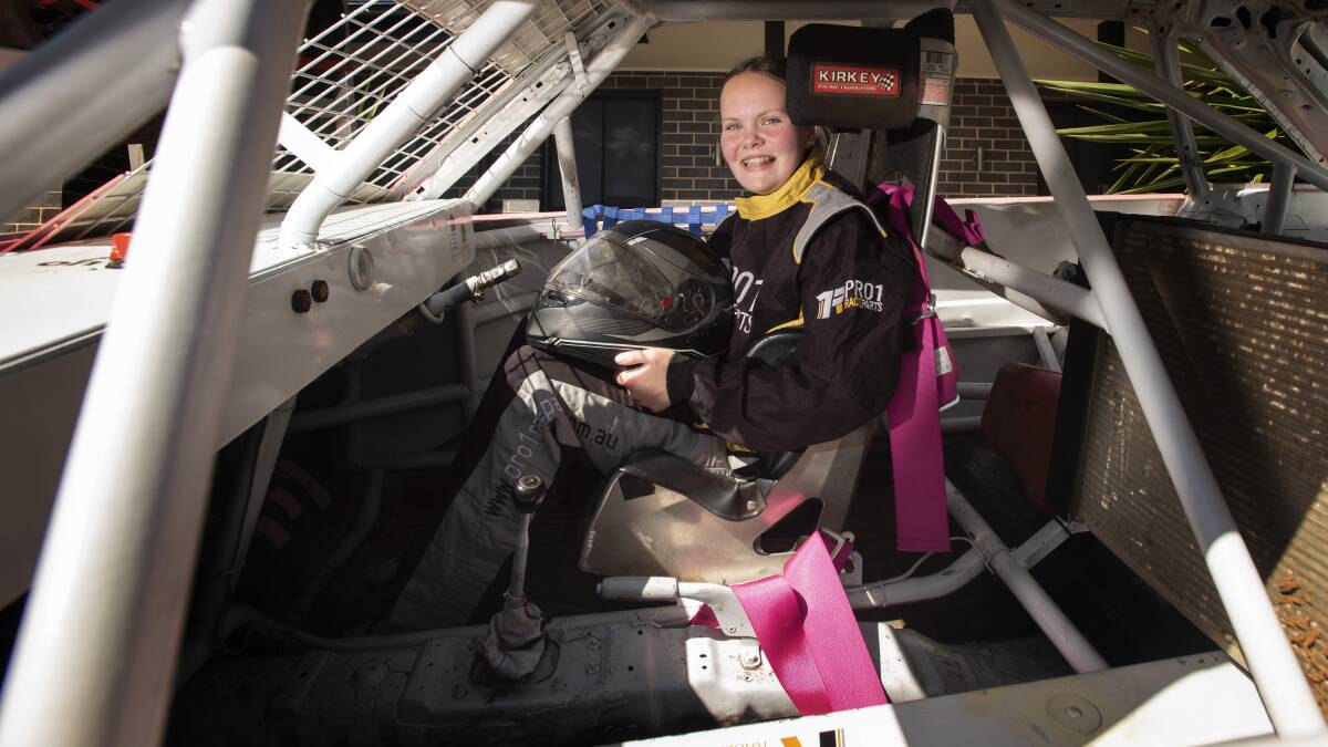 IN THE DRIVER'S SEAT: Isobelle Jennar-Urquhart waited a long time to race in the junior sedans. Photo: Peter Hardin