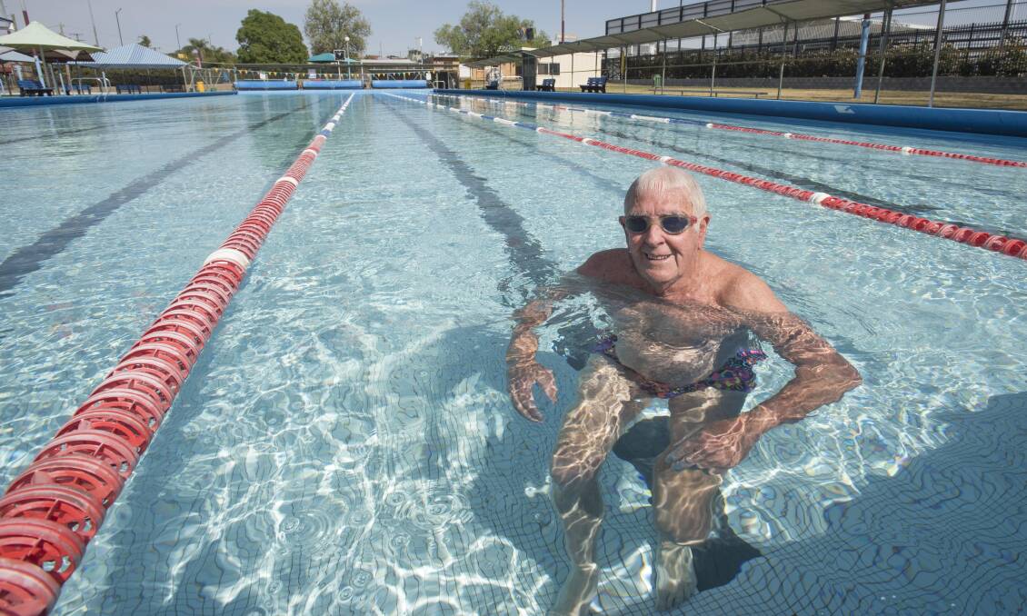 OPEN FOR BUSINESS: Peter Watson jumped in for a couple laps at the Scully Park Pool on Monday. Photo: Peter Hardin