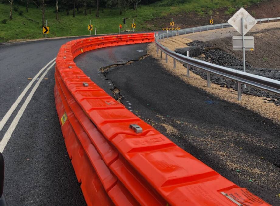 CRUMBLING: Significant damage to the recently upgraded Coulsons Creek Road has forced it to be cut off to heavy vehicles and a section to be reduced to one lane only. Photo: Julie Brooks