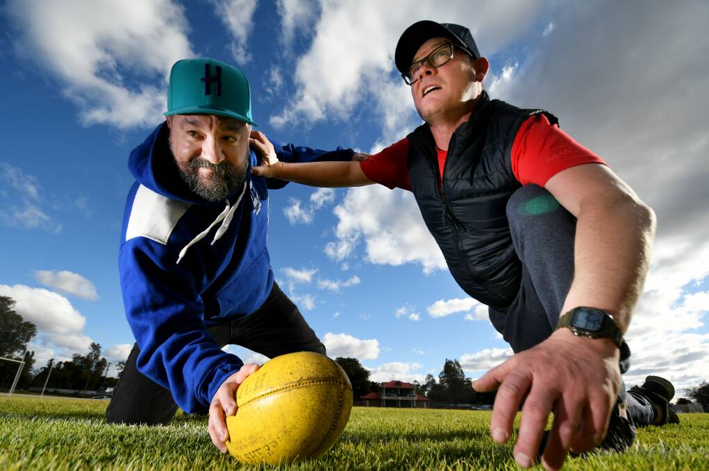 PUT YOUR MONEY WHERE YOUR MOUTH IS: The Tamworth Hotel publican Luke Prout the Post Office Hotel publican Andrew Coutts are having a friendly bet on this weekend's clashes. Photo: Gareth Gardner