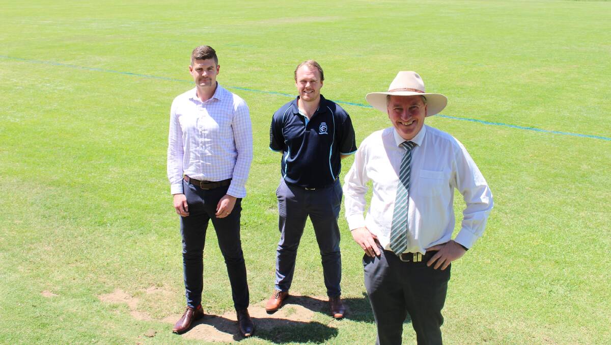 GRANT: Leading Edge Tamworth manager and equipment supplier Kurt Barrow, Tamworth Football Club's Brent May and Member for New England Barnaby Joyce. Photo: Supplied