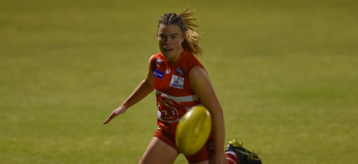 LEADER: Daisy George chases after the ball while playing for the Swans this year.
Photo: Ben Jaffrey