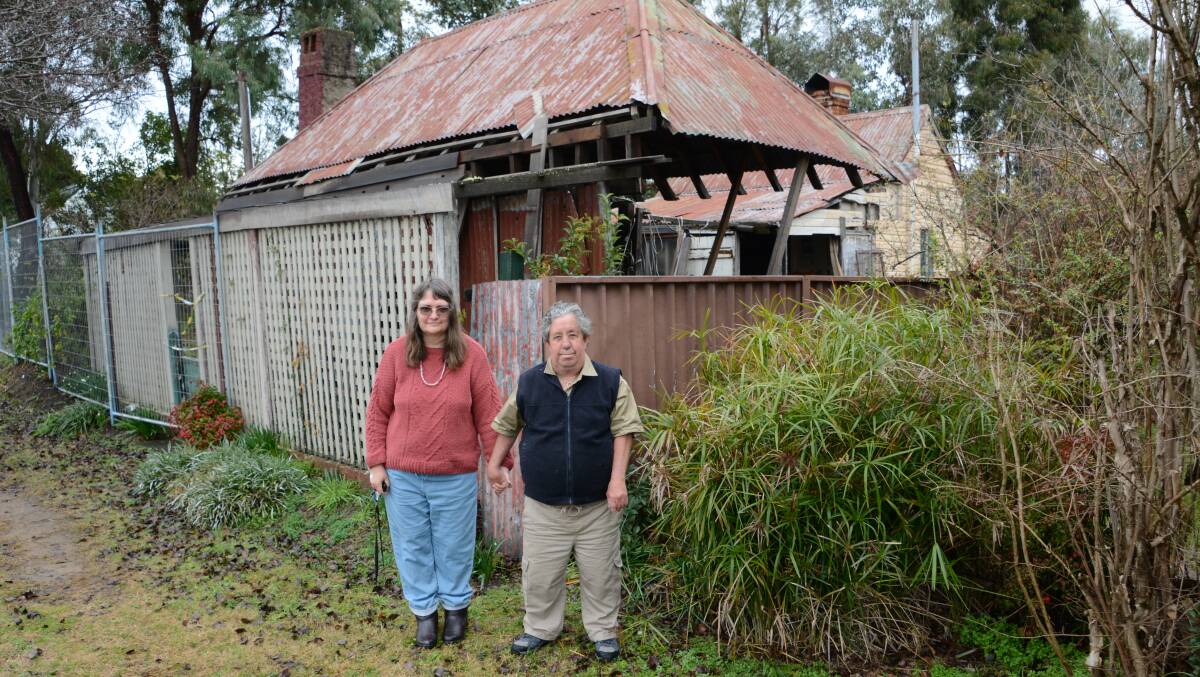 Barbara and Craig Smith at the Manners Street home they were hoping to restore, but are now likely to demolish.