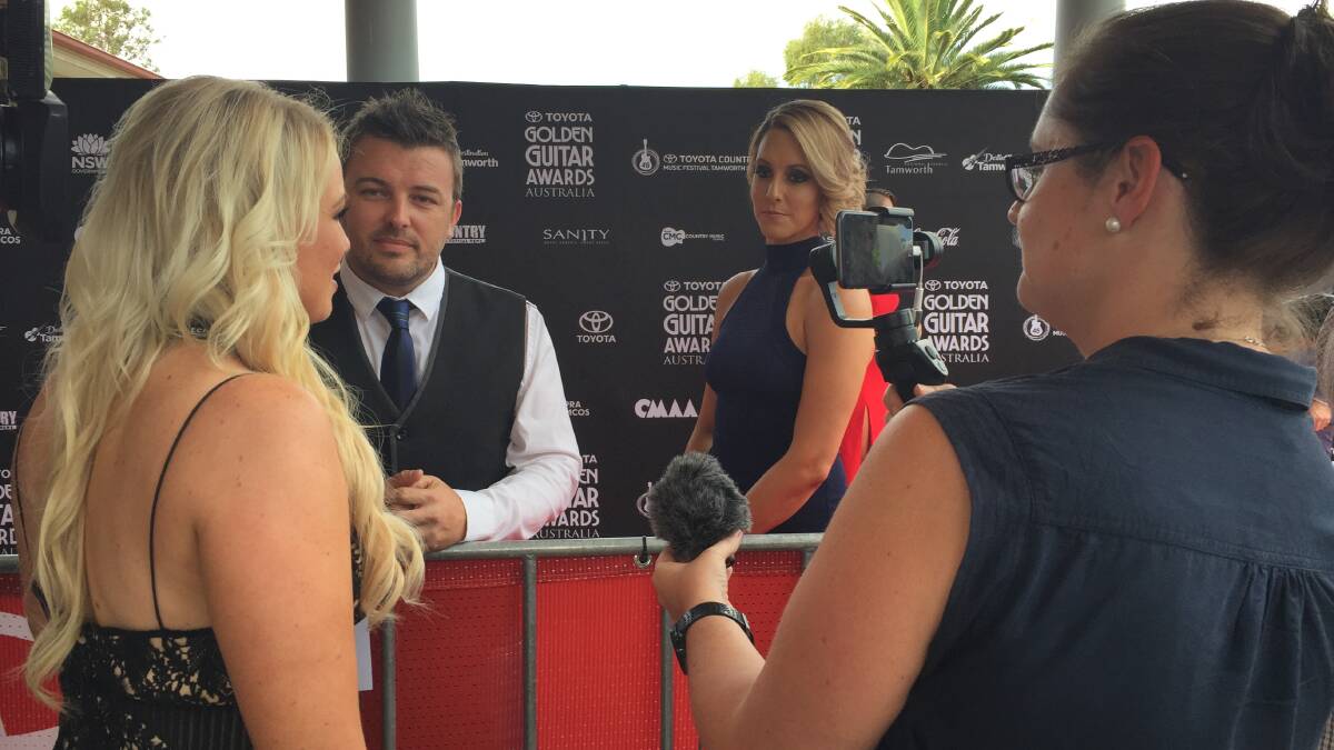 Hayley interviews Travis Collins who was on the red carpet with his wife Bec, while filming for The Leader is digital journalist Lynn Rayner.