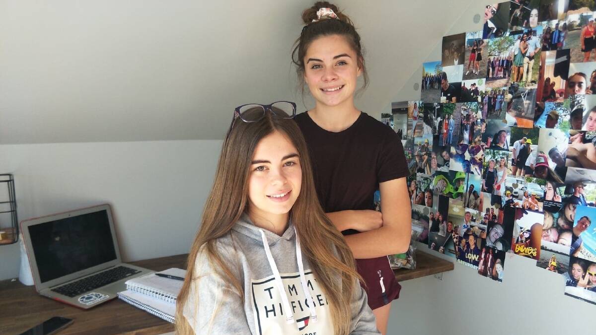 Bronte (front) and Bella Dagg attend different schools, but have been together at home during the lockdown period. 