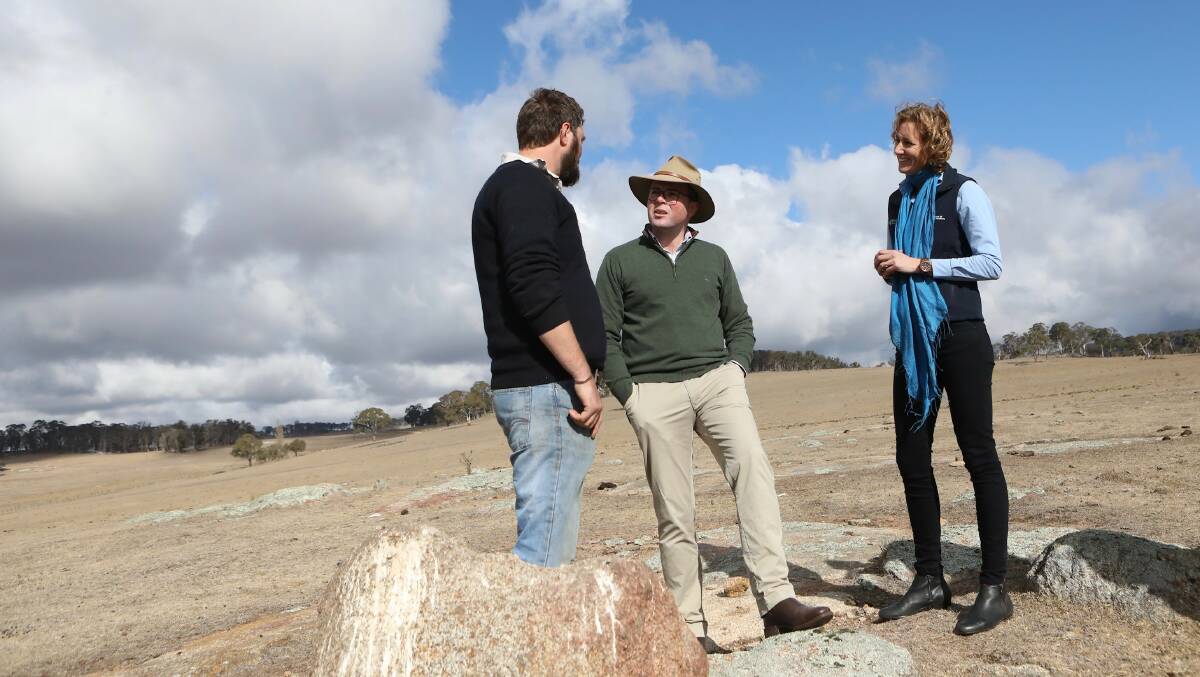Aberfoyle young farmer Callan Schaefer, left, with Agriculture Minister Adam Marshall and NSW Young Farmers Business Program co-ordinator Alex Hick on Callans property.
