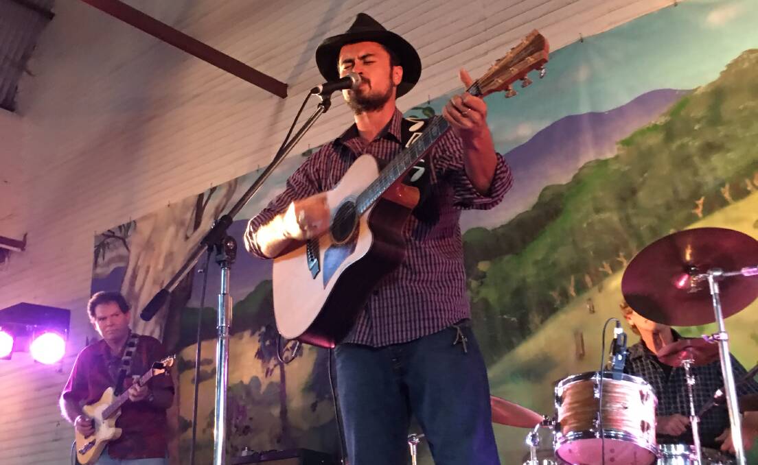 TRIBUTE: Amos Morris plays at the Slim Dusty Country Music Festival in Kempsey on Tuesday evening. He is the only artist to have played at the event every year, since it started as a small tribute on the first anniversay of Slim's death. Picture: Laurie Bullock