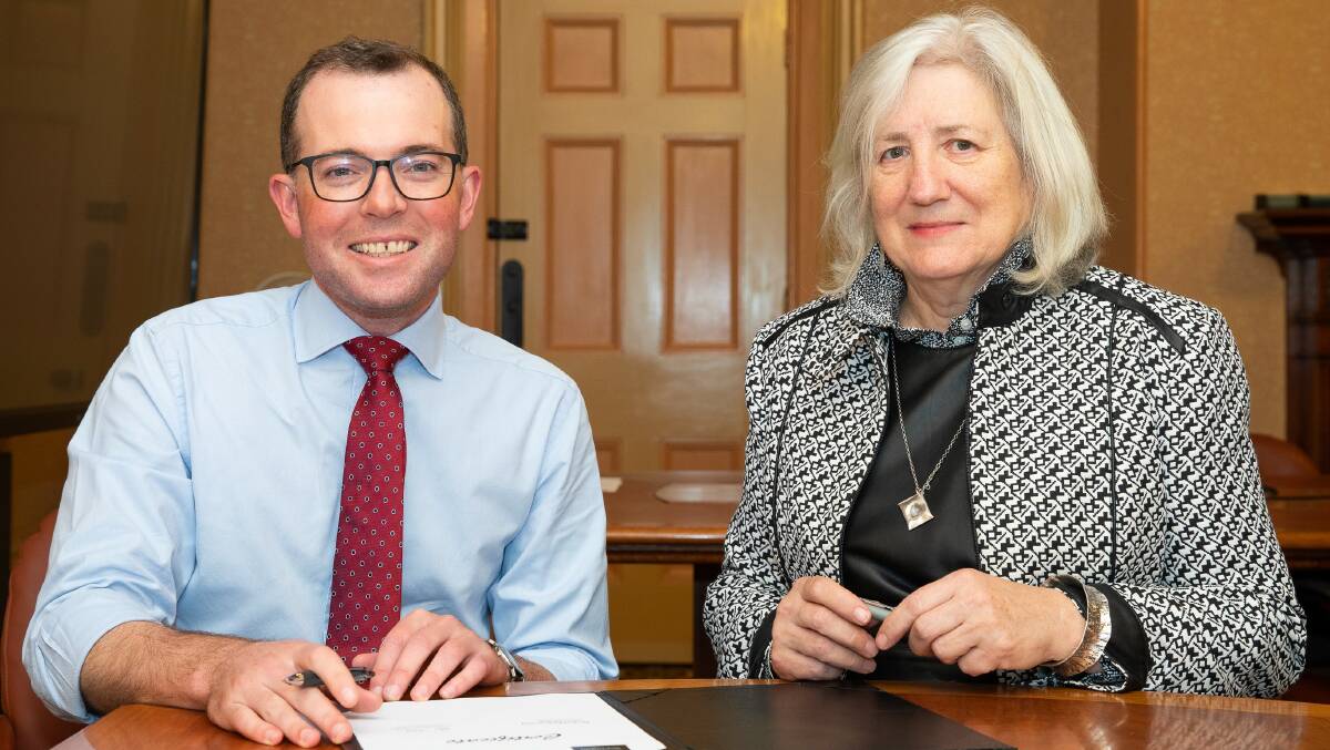 Northern Tablelands MP Adam Marshall with UNE vice-chancellor Brigid Heywood, who he believes should step aside until the court matters are determined. Picture supplied