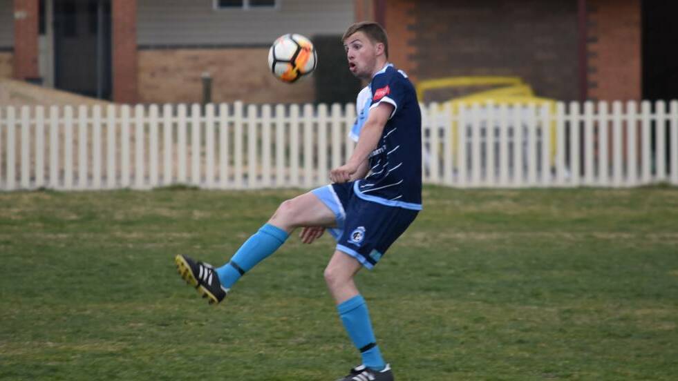 'VERY SPECIAL': Hayden Davidson in action in Tamworth FC's 3-0 defeat of South Armidale last weekend. The win stretched their unbeaten run to 18 matches. Photo: Ben Jaffrey