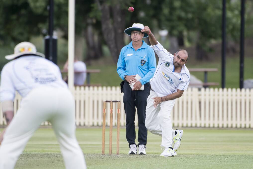 GRIP AND RIP: Old Boys spinner Amit Kumar searches for a scalp. He finished with 1-55 off 13 overs. Photo: Peter Hardin 	
