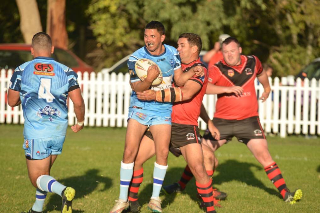 BEAR TRAP: Norths centre Andrew Moodie takes Josh Trindall for a ride earlier this year. The sides clash again in Narrabri on Sunday.