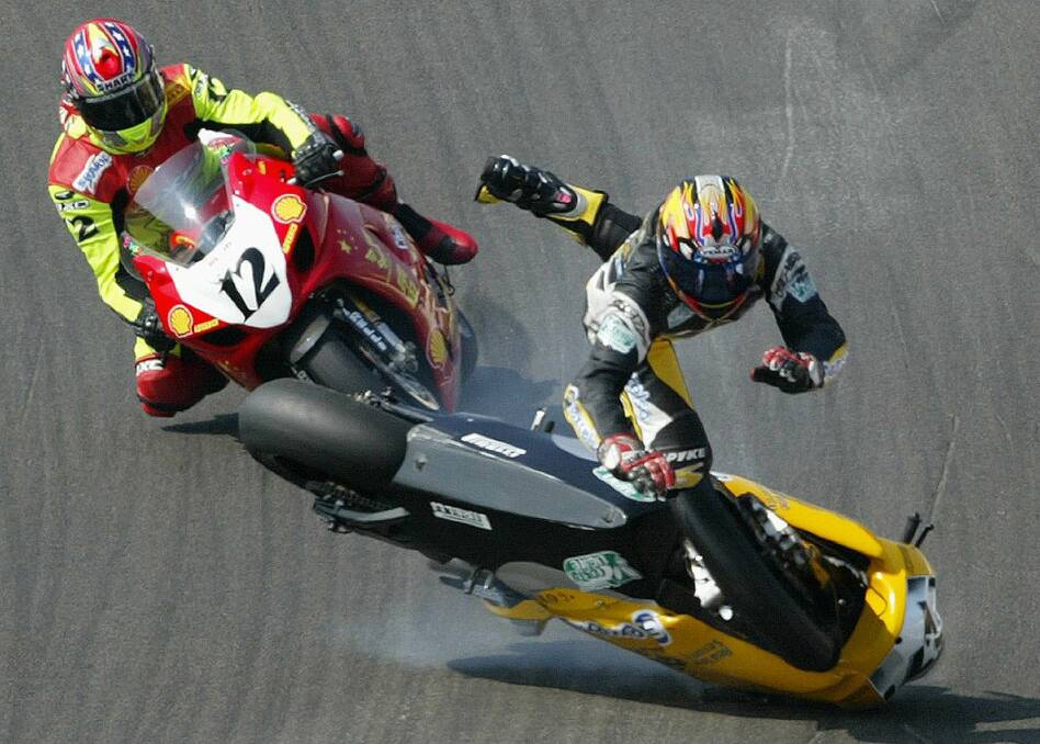 SWAN DIVE: Italy's Giancarlo DeMatteis crashes in front of Nowland in a Superbike World Championship round at Brands Hatch, England, in 2004. AP Photo/Gareth Fuller