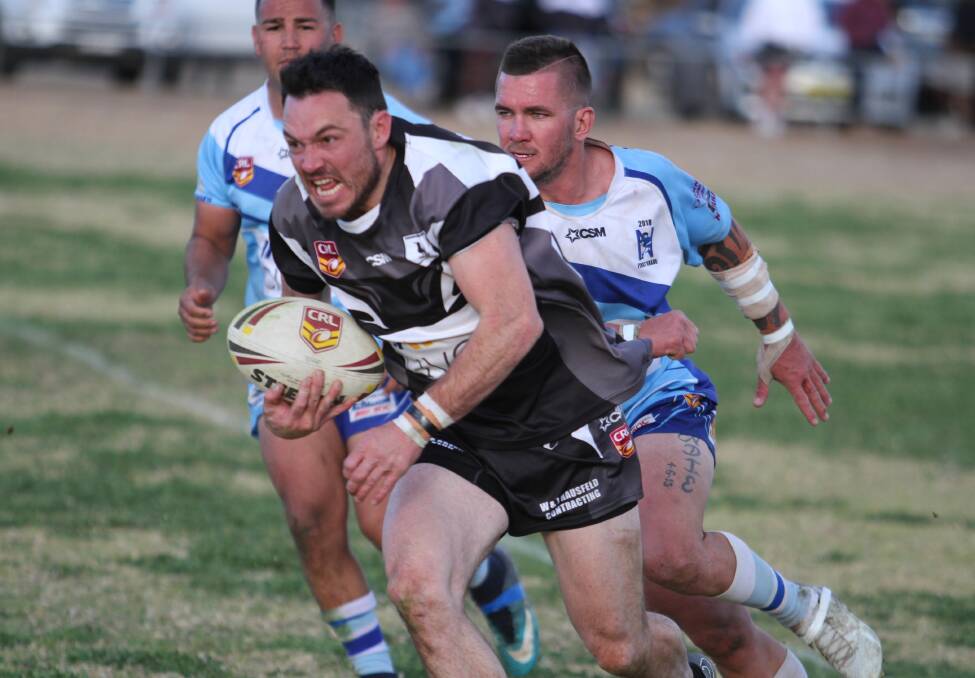FULL THROTTLE: Magpies No.15 Scott Hogg hits the afterburners. 