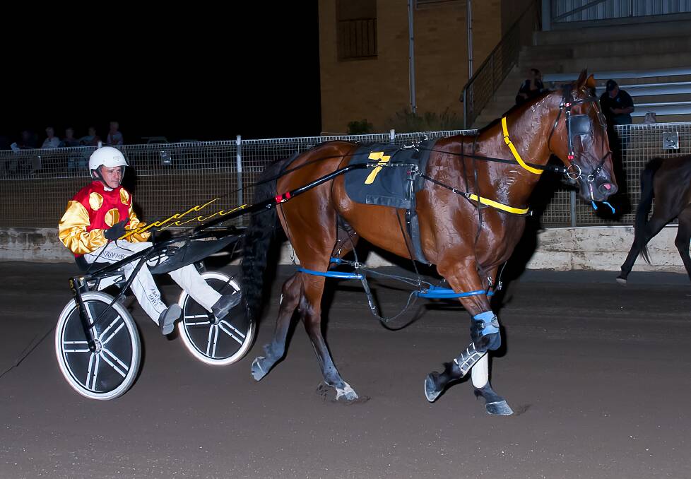 DYNAMIC DUO: Rolamax and Anthony Varga after their win at Tamworth Paceway on Sunday. Photo: PeterMac Photography