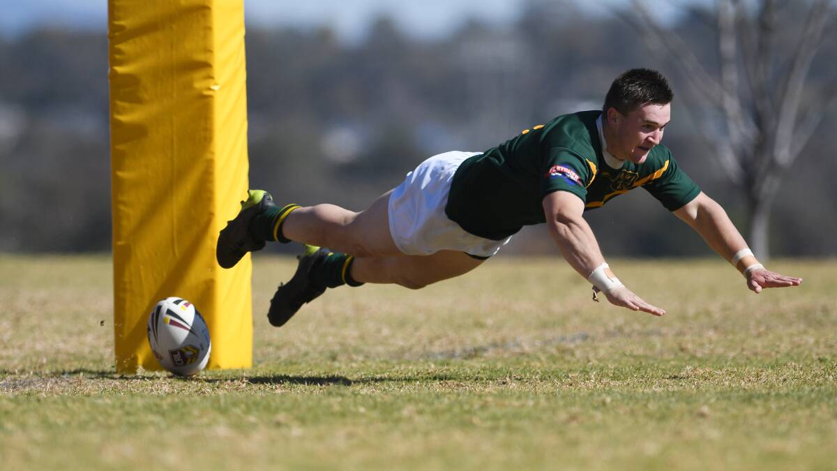 IS IT A BIRD ...?: Farrer skipper Max Altus scores a long-range try against Endeavour after going from dummy half inside his own half right on halftime. Photo: Gareth Gardner. 