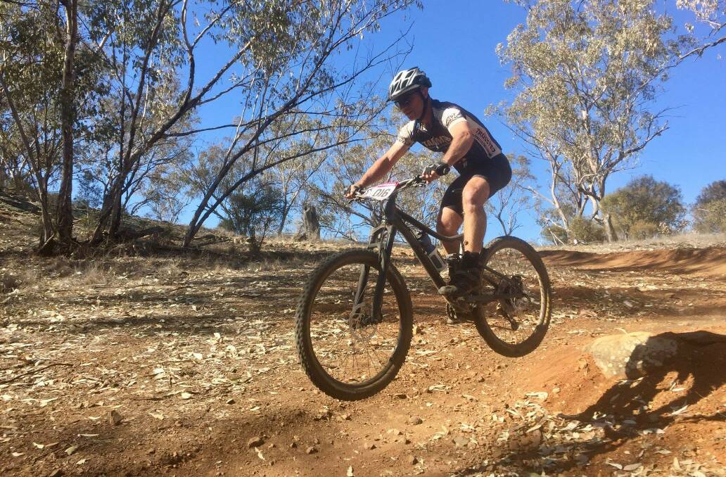 HANG TIME: Martin Siddons gets air during the final round of the Northern Inland Cross Country Mountain Bike Series at Tamworth.