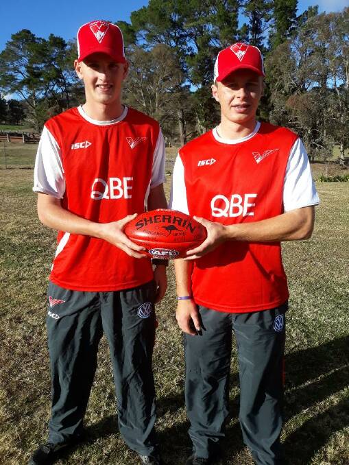 OPPORTUNITY KNOCKS: Lachie Martin and Morgan Dunn at the Dunn family's cattle farm outside Walcha on Thursday morning. Photo: Supplied