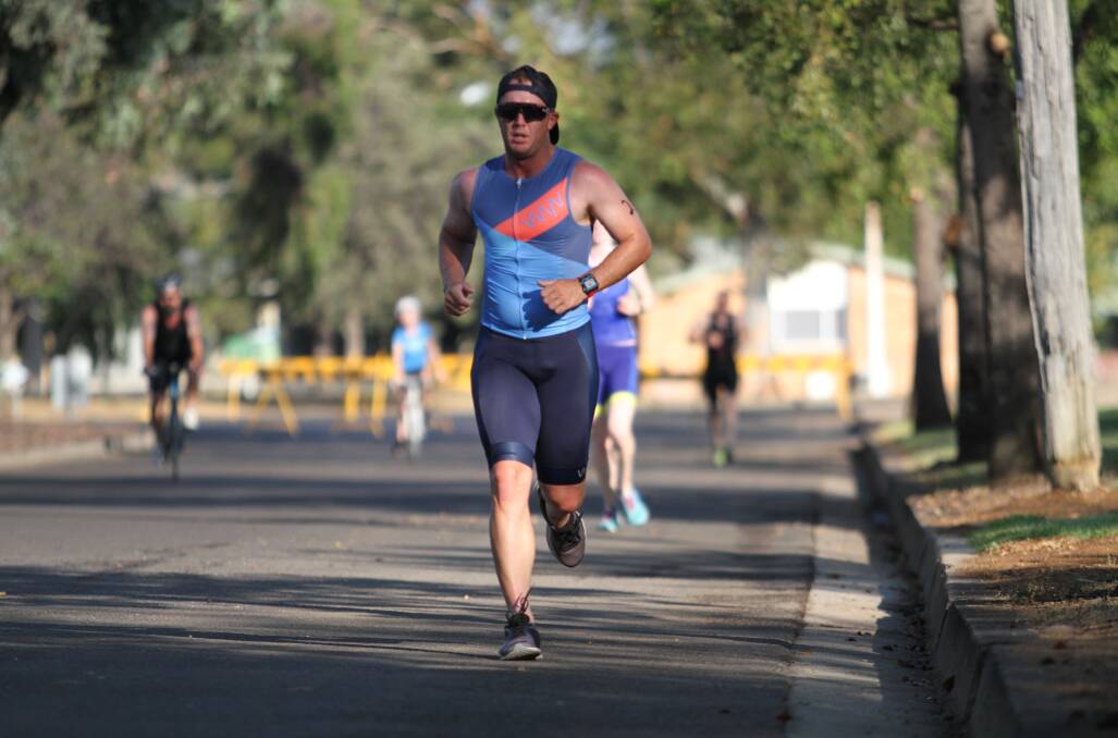 FORM FOUND: Daniel Nash en route to a much-needed victory in the Gunnedah Australia Day Triathlon. Photo: Mark Bode