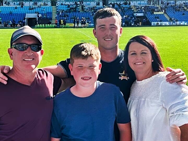 Kurt Fisher is joined by his mum and dad, Natasha and Justin, and his brother Jake at Cbus Super Stadium on the Gold Coast. Picture supplied