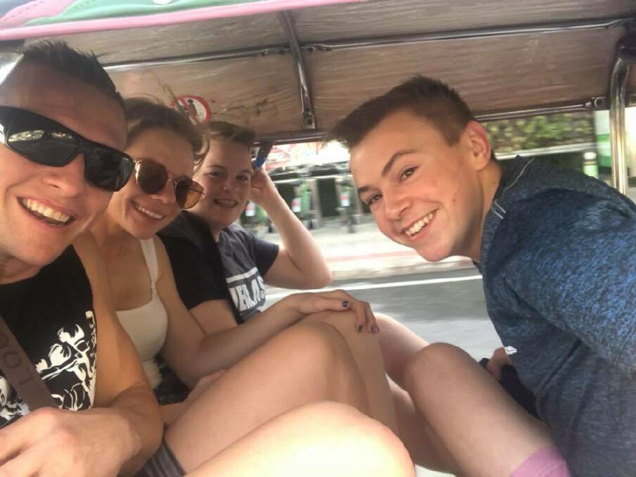 TIGHT FIT: No Thai trip is complete without a tuk-tuk ride.