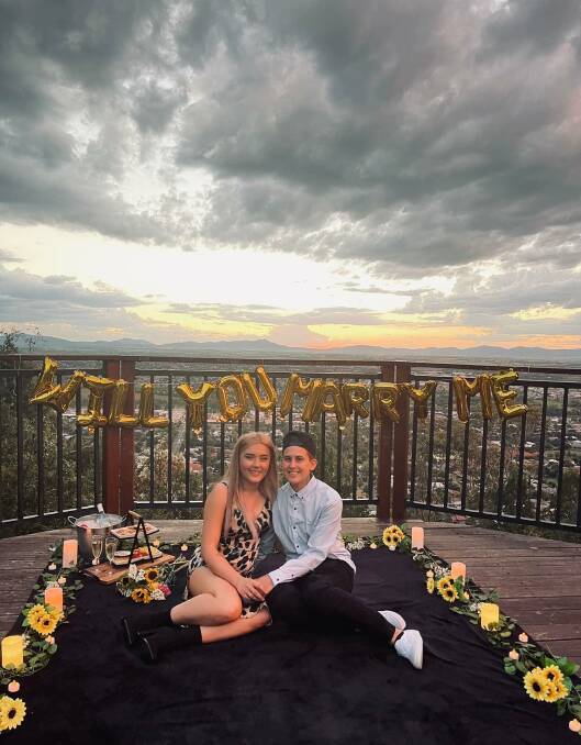 SPECIAL: Flett proposed to Hannah Peterson at the Oxley Lookout in December. Photo: Facebook