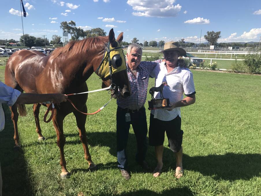 SWEET SUCCESS: Geoff O'Brien with race sponsor Marty Wilson after Dominica's win in the Cactus Wilson Memorial at Quirindi. 
