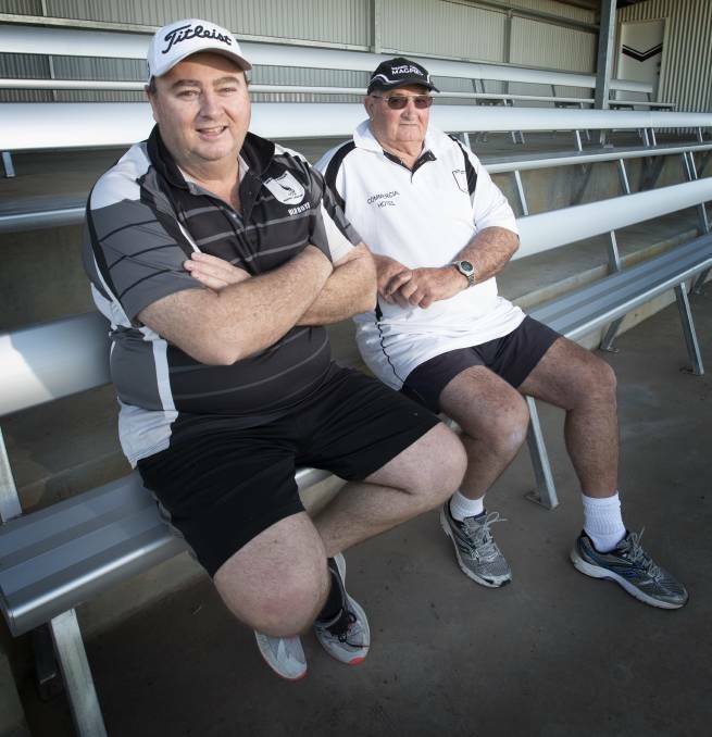 Jason Leonard and his father, Trevor, are photographed at David Taylor Park in 2020. Picture by Peter Hardin 