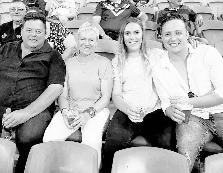 FAMILY PORTRAIT: Jody Cooper with his wife, Vicki, and their children, Georgia and James, at the rugby league World Cup final at Suncorp Stadium in December, 2017.
