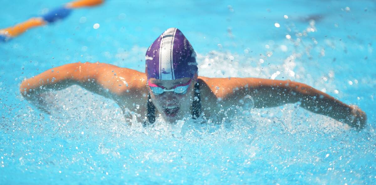 FLYING: Deasey contests a heat of the 50m butterfly on Saturday.