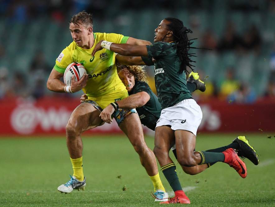ON FIRE: John Porch scored three tries for Australia at the Commonwealth Games: Photo: AAP