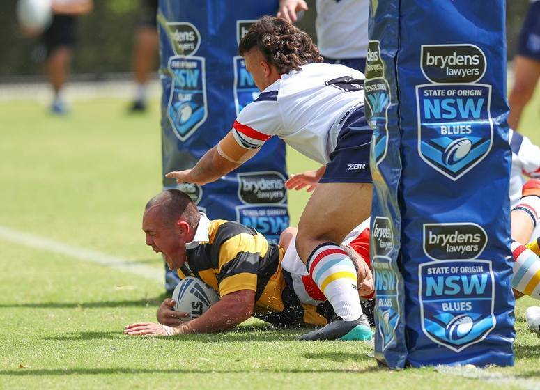 FLASHBACK: Tigers fullback Mitch Henderson scores in the Laurie Daley Cup grand final. Photo: NSWRL