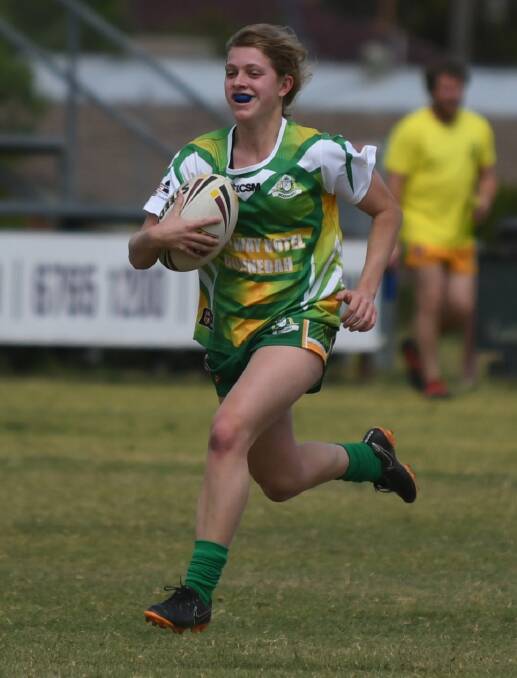 HIGH ALERT: Roos flyer April Smith has made a successful transition from union to league: Photo: Samantha Newsam