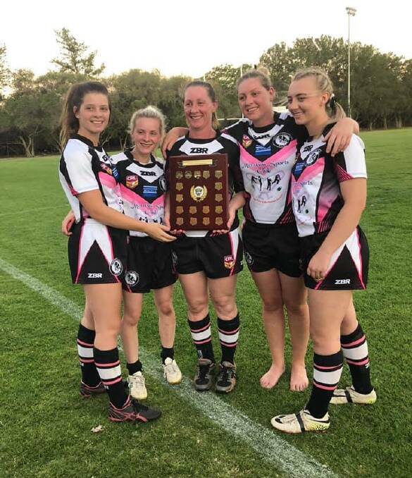 FAMILY ACT: Gaynor Blackadder (centre) and her daughter, Shai (right), celebrate with Merriwa Magpies teammates. Photo: Facebook