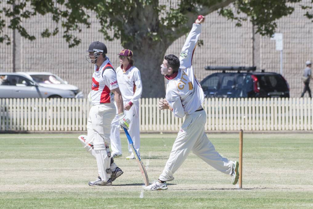 IN A SPIN: Scott Brennan en route to snaring 7-43 against Norths. Photo: Peter Hardin