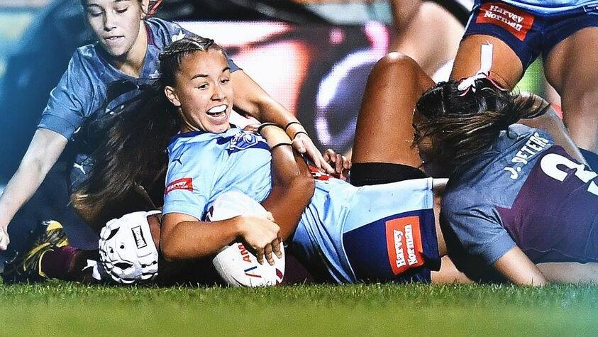 OH YEAH! Taylor scores her first try against Queensland. Photo: NSWRL