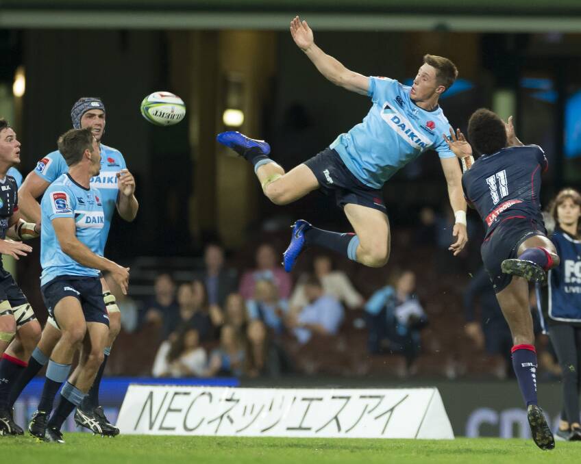 FLYING HIGH: Glen Innes export Alex Newsome has signed a new deal with the Waratahs. Photo: Craig Golding/AAP