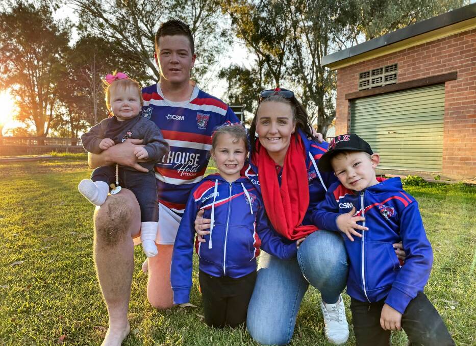 Smith with his partner and Marlee's mum, Tina Dawe, and her children, Sophia and Coby. 