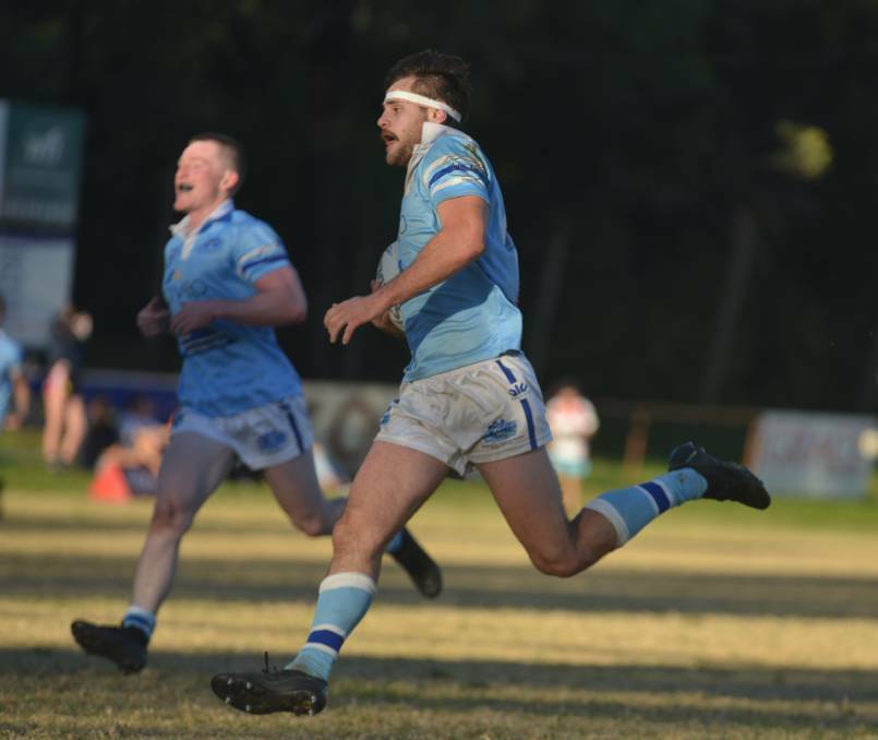 DANGEROUS: Blues No 9 Jake Nichols en route to the tryline against the Roosters this year. Photo: Mark Bode