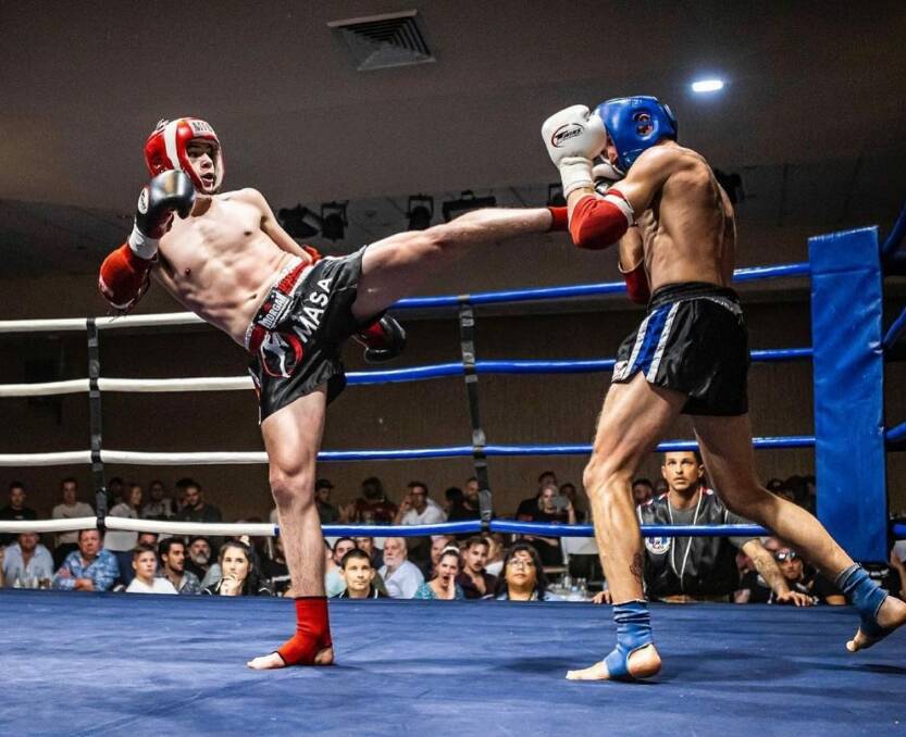 WEAPON: Josh McCulloch (left) attacks Sydney's Sean Lightfoot en route to winning his last fight. Photo: Iron Monkey Photography