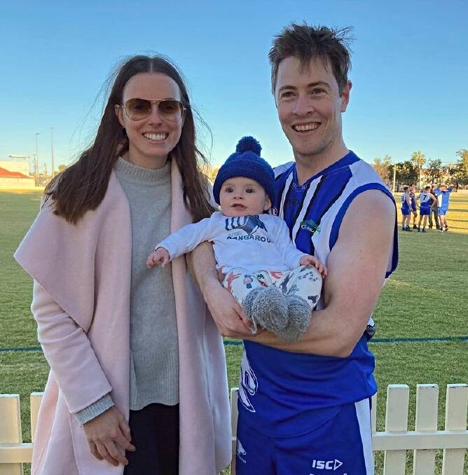 Richard O'Halloran and Rachel Ostler and their son, Joseph, enjoy a day at the footy. Picture Facebook