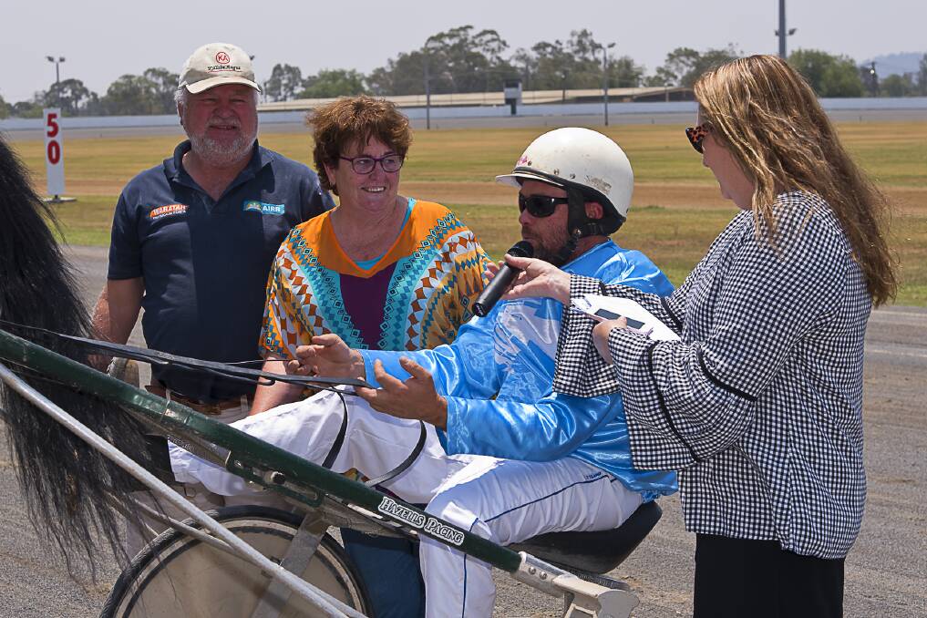 SPEED: Julie Maughan interview's Pure Laughter's driver Danny Mackney, as the horse's owners, Rod and Di Hazell, look on. Photo: PeterMac Photography