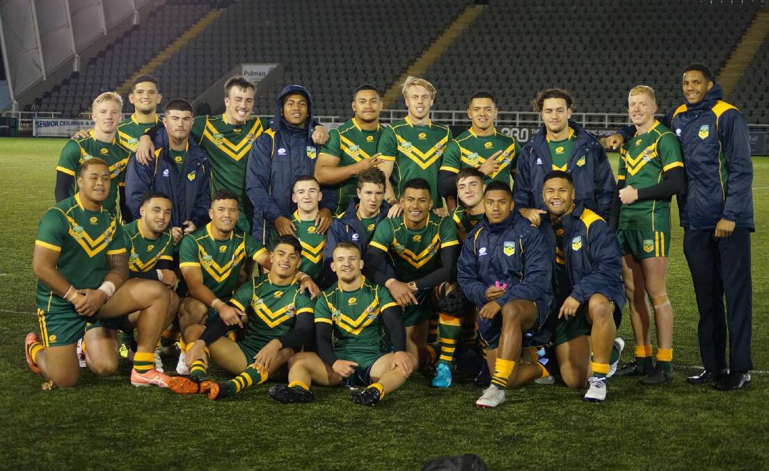 SPECIAL: Altus (first left middle row, kneeling) after Australia's 92-0 defeat of England Colleges at Newcastle's Kingston Park last week.