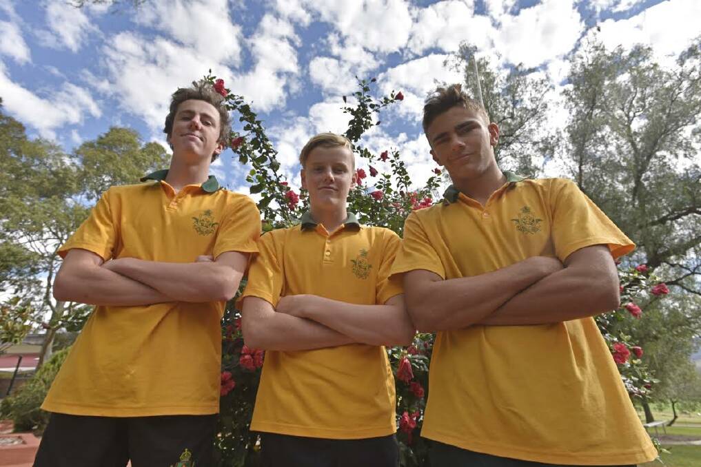 TERRIFIC TEEN: Cody (right) after being named in the under-15 NSW Combined High Schools league side. He is with fellow Farrer students and top athletes Ned Hoath (left) and Aidan Bermingham. Photo: Billy Jupp