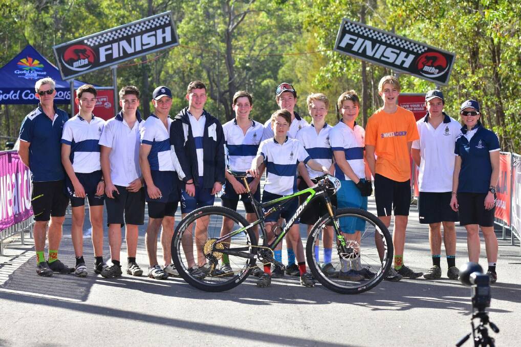 The TAS team at the Mountain Bike Australia Schools Championships (L to R): Richard Newton, Toby McMaster, Riley Simmons, Josh Armstrong, Jack Sewell, Jack Armstrong, Angus Goudge (holding bike), Duncan Chalmers, Hamish Chalmers, Archi Lawrence, Marcus Worth (Great Lakes College), Archie Chick and Jo Benham.