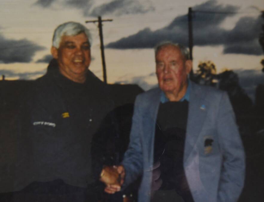 LEGENDS MEET: This photo of Jack and league Immortal Arthur Beetson hangs in North Tamworth's clubhouse. 