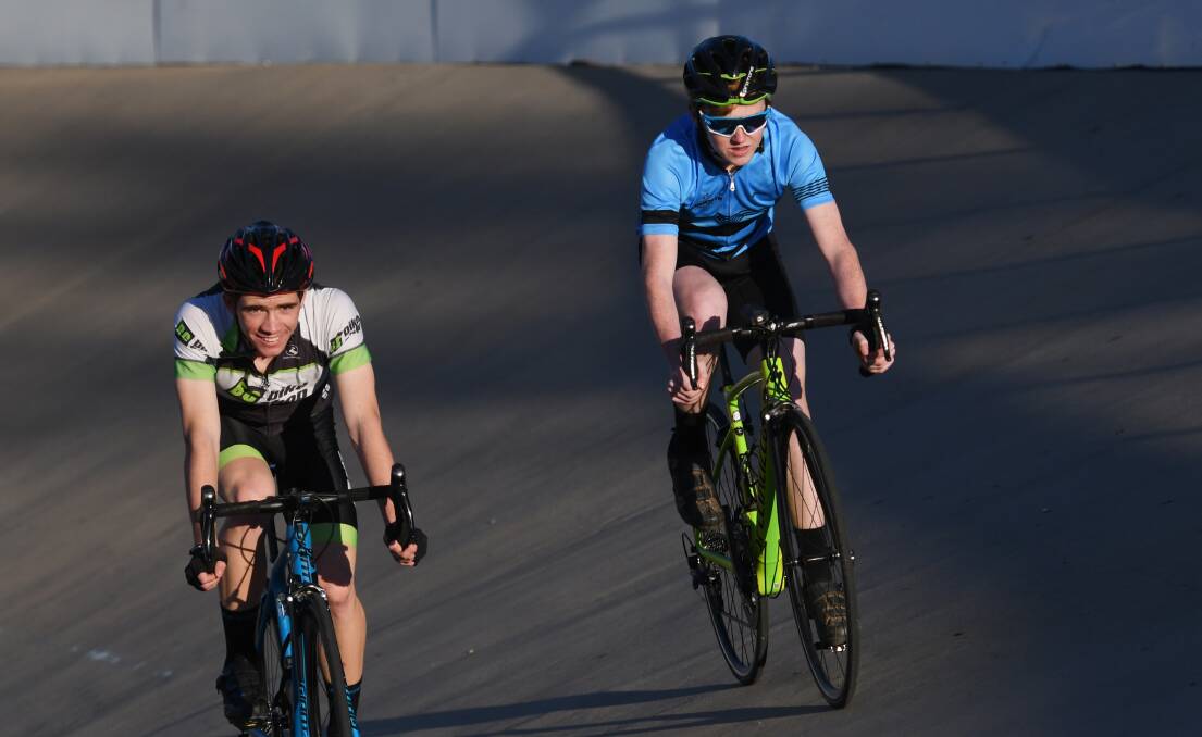 THE FUTURE: Steven Roberts and Conor Noonan, both 16, are products of Tamworth Cycle Club's youth initiative. Photo: Gareth Gardner 